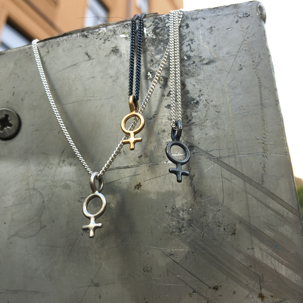 Minna Feminist Tiny Symbol Necklace Bronze